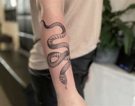 50+ AMAZING SNAKE TATTOO DESIGNS & THEIR。